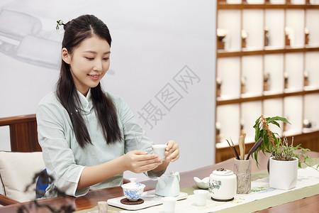 泡茶的女茶艺师背景图片