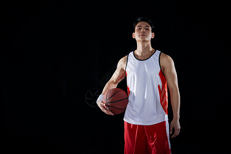 篮球用品打篮球的男性形象背景