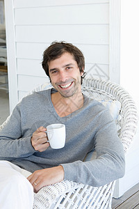 笑着喝咖啡的人幸福高清图片素材