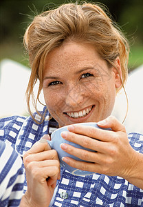 妇女喝茶背景图片