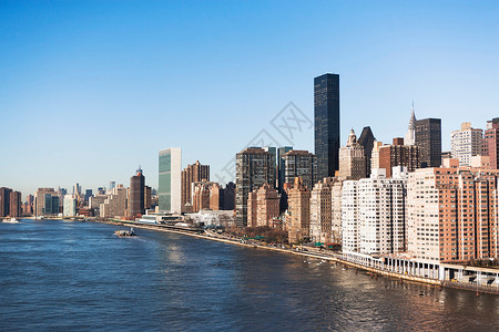 美国纽约市哈德逊河沿岸的摩天大楼和建筑蓝天高清图片素材