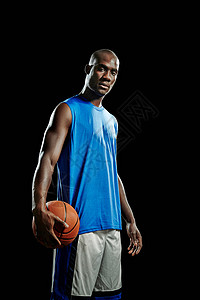 男篮球运动员手握篮球图片
