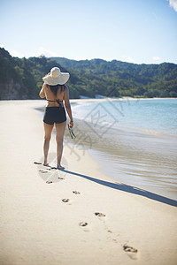 新西兰科罗曼德尔半岛新楚姆海滩的女人图片