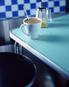 饭桌上的咖啡杯背景图片