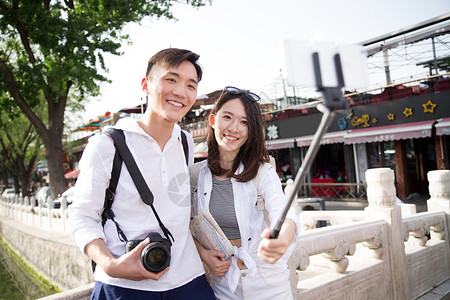 幸福北京自拍杆青年情侣旅游照相图片