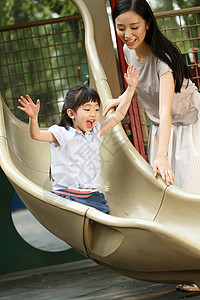 温馨园林愉悦摄影度假小女孩滑滑梯背景