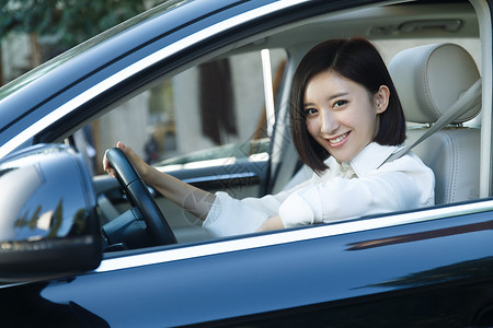 青年女人开车车窗高清图片素材