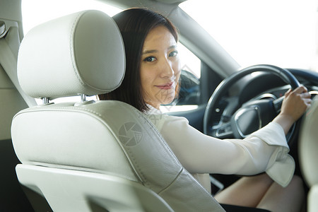 时尚青年女人开车民用车高清图片素材