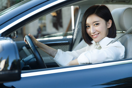 城市生白领青年女人开车中国高清图片素材