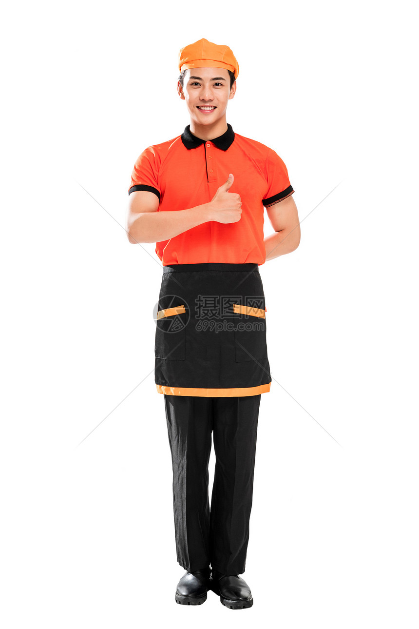 肖像工作服成年人竖起大拇指的年轻餐厅服务员图片