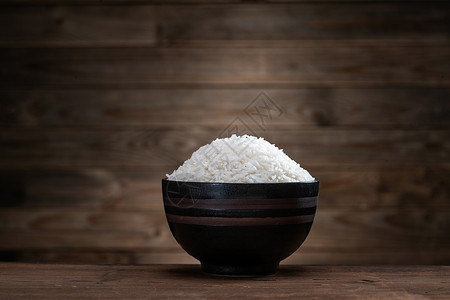 木质桌面上的一碗米饭中国高清图片素材
