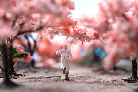 樱花设计樱花树下的医护人员奔跑的背影背景
