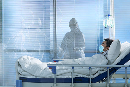 患者躺在医院病床上传染病高清图片素材