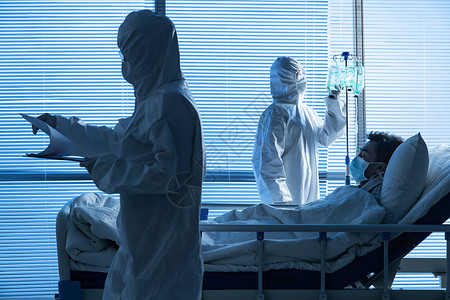 预防新型冠状医生在病房里给患者治疗服务高清图片素材