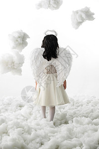 摄影仙女棉花天使装扮的小女孩玩耍图片