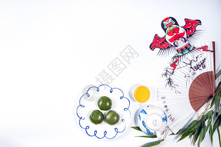 清新燕子茶壶青团和传统文化工艺品背景