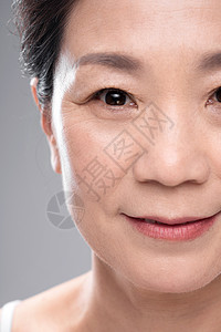 中年女人妆面局部特写自信高清图片素材