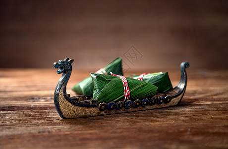 端午拟人小粽子东方食品粽子和龙舟背景