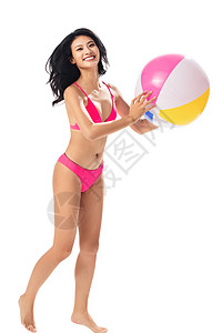 愉悦度假拿沙滩球的比基尼美女图片