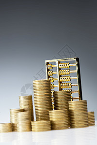 飞舞黄色金币金色财会大量金币和算盘背景