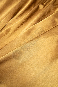 华贵布料垂直构图金色丝绸背景图片