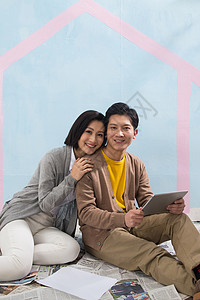 年轻夫妇装修房子家务劳动高清图片素材