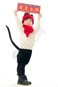 东亚庆祝垂直构图小男孩过年穿新衣服图片素材