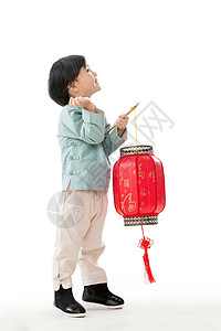 人拿着文化一个小男孩手提红色灯笼庆祝新年高清图片