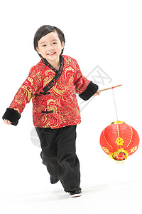 背景分离垂直构图愉悦一个小男孩手提红色灯笼庆祝新年高清图片