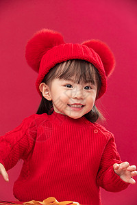 版红衣小女孩传统节日亚洲传统文化穿红衣戴红帽的可爱小女孩背景
