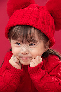 毛衣摄影穿红衣戴红帽的可爱小女孩好奇心高清图片素材