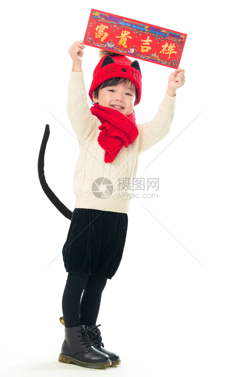 放松人传统节日可爱的小男孩拿着春联图片