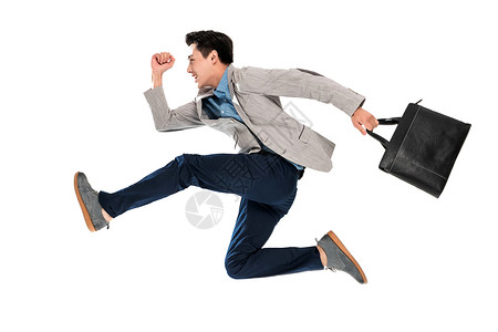 拿手提包奔跑的青年商务男士高清图片