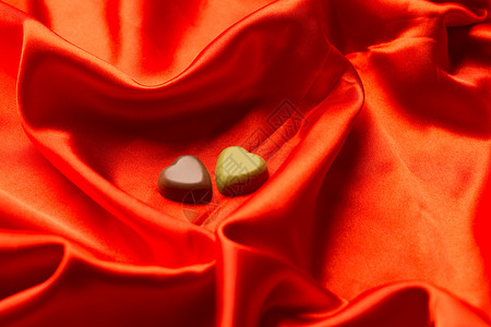 红色爱心丝绸绸缎机织织物无人情人节静物背景