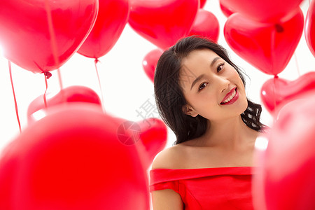 情人节亚洲人愉悦青年女人和气球图片