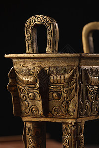 铜器历史花纹铜鼎背景图片