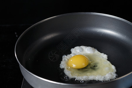 煎鸡蛋的锅饮食煎鸡蛋背景