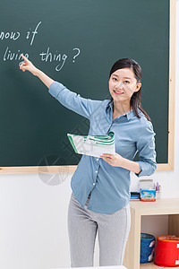 英文课程指导教师认真的贡献女教师在教室里背景