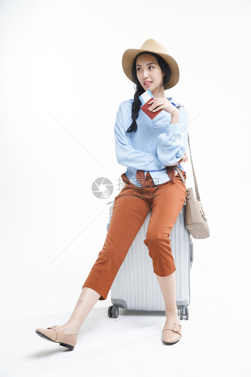 彩色图片休闲装帽子青年女人旅行图片