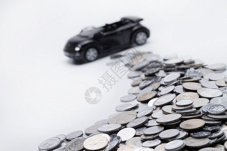 概念汽车硬币和汽车模型背景