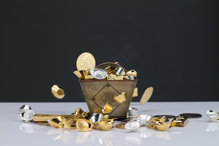 金币元宝金元宝影棚拍摄无人金子和银子背景