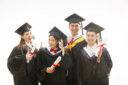 兴奋表情啊毕业大学生穿着学士服庆祝毕业背景