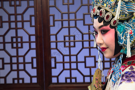 女人表演艺术活动艺术家京剧画脸高清图片素材