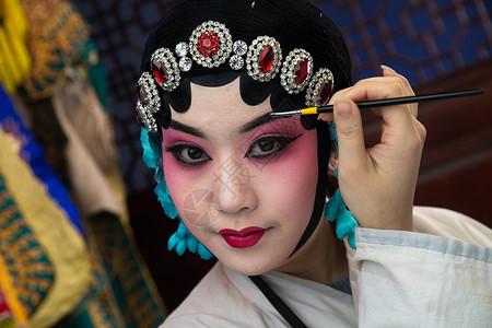 彩妆摄影亚洲人女人摄影女京剧演员后台化妆背景
