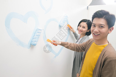摄影幸福青年伴侣年轻夫妇装修房子起居室高清图片素材