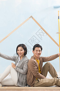 活力20多岁公寓快乐家庭装修房子青年夫妇高清图片素材