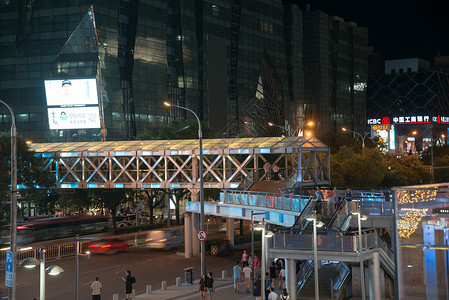 繁华焕新毛笔字高层建筑市中心新的北京商业街夜景背景