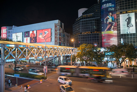 繁华焕新毛笔字新的奢华办公大楼北京商业街夜景背景