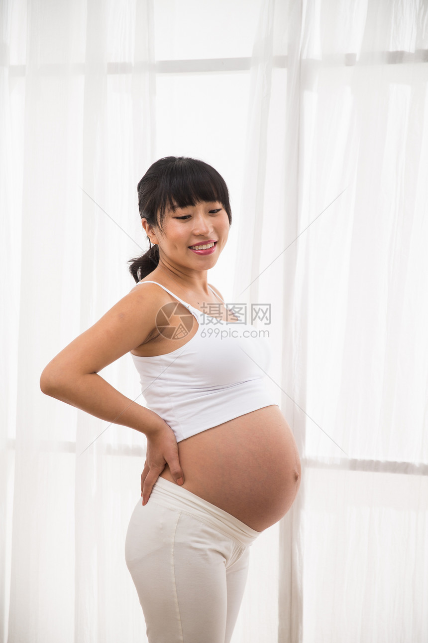 生长享乐保护幸福的孕妇图片