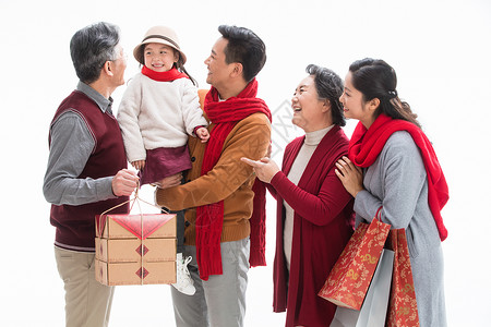 抱着礼物小孩彩色图片热情夫妇幸福家庭庆祝新年背景